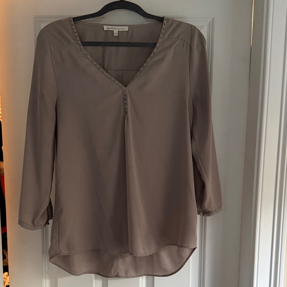 Taupe V-Neck 3/4 sleeve blouse with beaded neckline.